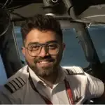 Picture of Pilot Smit Machchhar in the cockpit of a plane