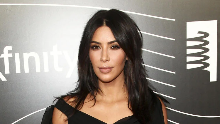 Kim robbed at gunpoint by fake police in