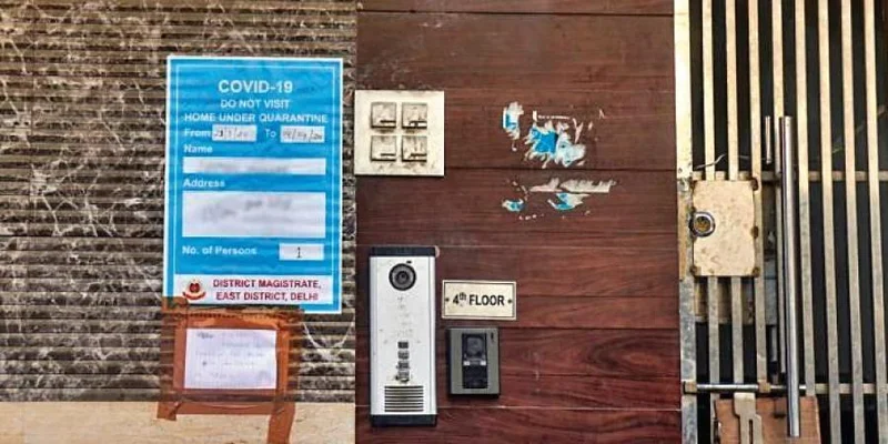 posters at COVID-19 patients houses