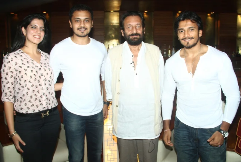 Shekhar Kapur with the owners of Escobar, Vardhaman & Rushabh Choksi
